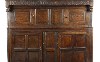 AN OAK PRESS CUPBOARD 17TH CENTURY AND LATER...