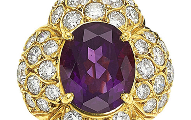Amethyst, Diamond, Gold Ring The ring features an oval-shaped...