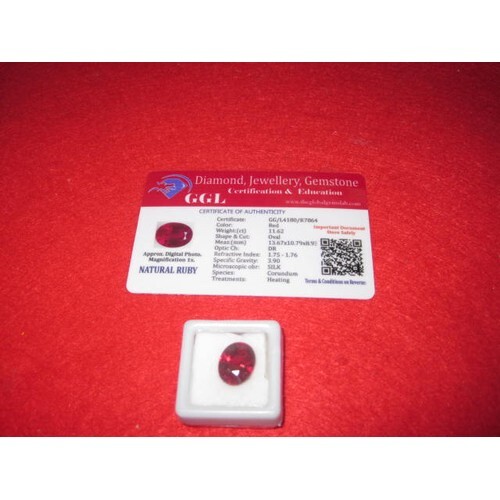 An 11.62ct oval natural Ruby with a Certificate of Authentic...