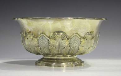 An American sterling silver circular bowl, decorated in relief and engraved with a band of stiff lea