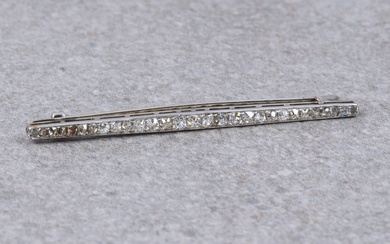An Art Deco 18ct white gold and diamond bar brooch
