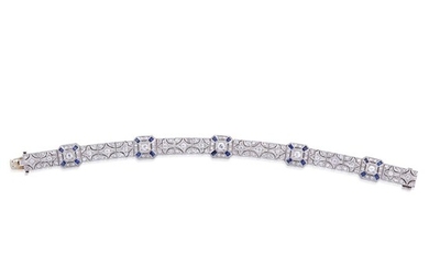 An Art Deco diamond, sapphire, and platinum bracelet comprised...