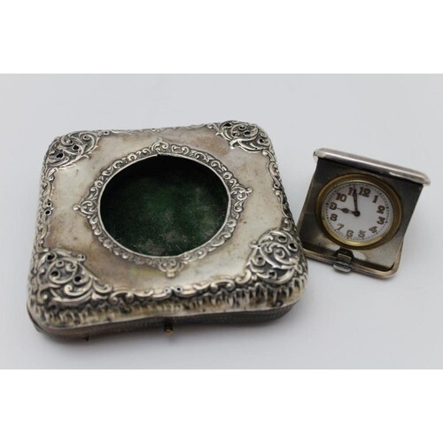 An Edwardian silver mounted pocket watch holder, having ease...