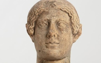 An Etruscan terracotta votive head