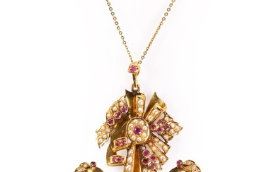 An Indian gold ruby and split pear pendant and earring set, c.1950