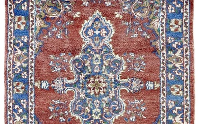 An Indian rug, mid 20th century.
