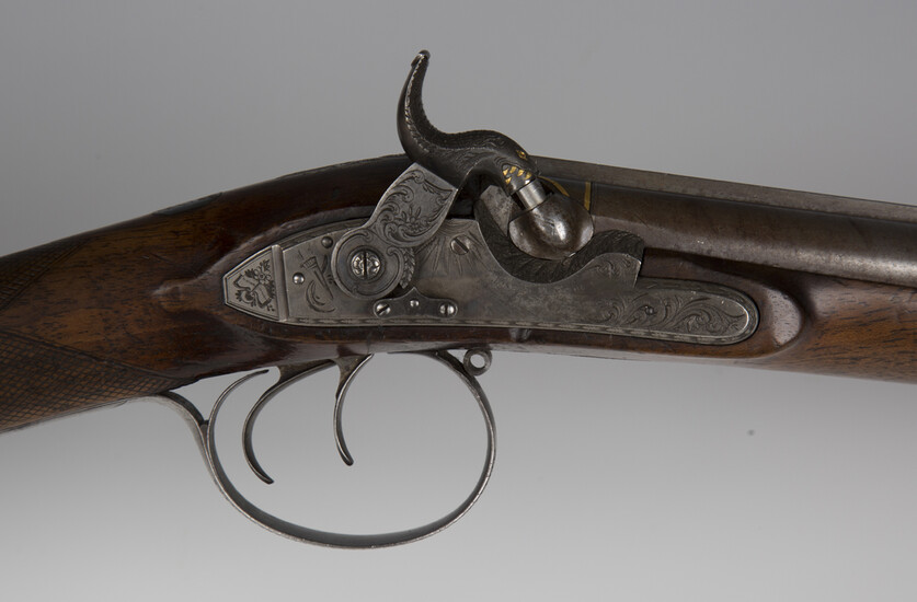 An early 19th century 20-bore double-barrelled percussion sporting gun by Joseph Manton, serial numb
