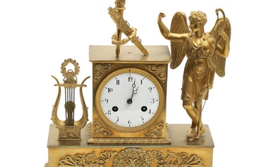 An early 19th century French figural mantel clock adorned with Amor, white...