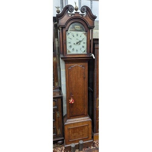An early 19th century oak eight day longcase clock, the pain...