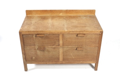 An early/mid-20th century oak low chest of drawers.