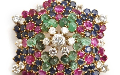 An emerald, ruby, sapphire, and diamond brooch set with numerous cabochon emeralds, circular-cut rubies, sapphires, and brilliant-cut diamonds. Rome, 1950.