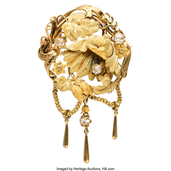 Antique Diamond, Gold Brooch The brooch features Old mine-cut...