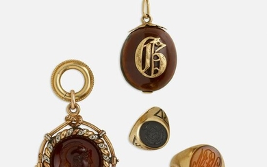 Antique gold watch fob, chestnut charm, and two rings