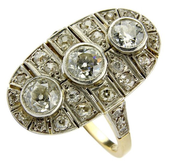 Art-Déco diamond ring in yellow gold, Italy circa 1920, hallmarked 750, marquise shaped ring head with applied platinum, set with 3 large diamonds in old brilliant cut, total weight approx. 1.55 ct, white, si - P1, and 26 diamonds in 8/8 cut, total...