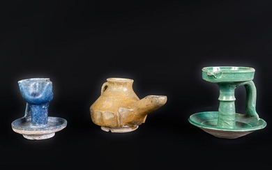 Arte Islamica Three glazed pottery lamps Iran and