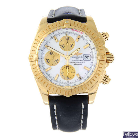 BREITLING - an 18ct yellow gold Chronomat Evolution chronograph wrist watch, 42mm.