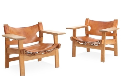 Børge Mogensen: “The Spanish Chair”. A pair of oak easy chairs. Seat and back of patinated natural grain leather.