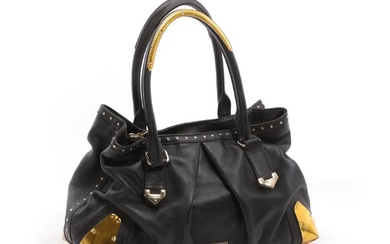 Burberry A bag of dark brown leather with gold tone hardware, two...