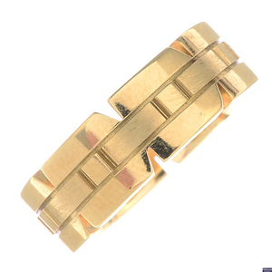 CARTIER - an 18ct gold 'Tank Francaise' ring.