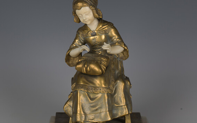 Charlotte H. Monginot - an early 20th century French gilt bronze chryselephantine and carved ivory f