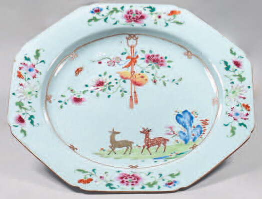 Chinese porcelain dish. Qianlong, 18th century. Octagonal in shape, decorated with the enamels of the Rose Family, in the middle of deer in a landscape with rocks and surmounted by flowering branches and a gourd hanging, bunches of flowers on the wing...