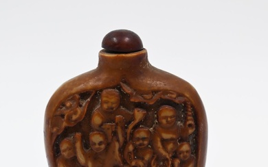 Chinese stone snuff bottle, hand carved. Decorated with delicate...