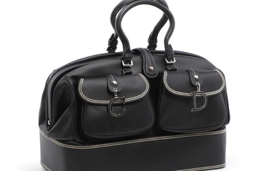 Christian Dior A “Détective” bag of black leather with white stitching, silver...