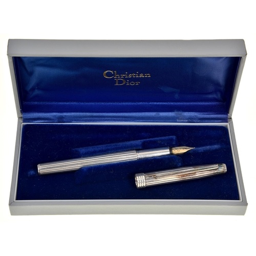 Christian Dior. A silver fountain pen, maker's marks, cased...