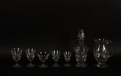 DAUM France, cut crystal service part comprising : - 5 water glasses (small differences in size; a grindstone is attached) - 3 wine glasses - 7 Rhine wine glasses - 12 champagne glasses (6 with splinters. One very bumpy) - 11 glasses in Porto - 1...