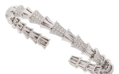 Diamond, White Gold Bracelet The flexible cuff features full-cut...