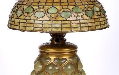 EARLY TIFFANY STUDIOS ACORN LEADED AND FAVRILE GLASS KEROSENE TABLE LAMP