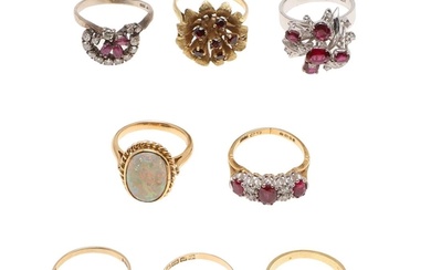 EIGHT ASSORTED RINGS. including a ruby and diamond ring, set...