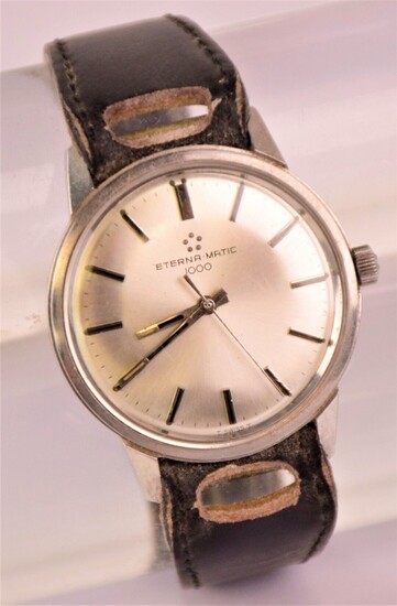 ETERNA Bracelet-montre d'homme mécanique en acier modèle "1000", lunette ronde,...