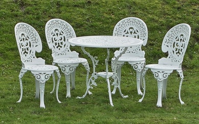 Ensemble de meubles de jardin 5 pièces ; table et quatre chaises. Zinc moulé, laqué...