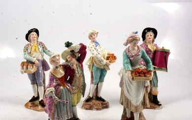 Four Meissen style figures, and a Derby group