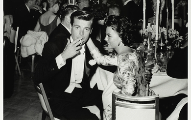 Frank Worth (American, b.1923-d.2000): A black and white photographic print of Robert Wagner and Natalie Wood, 1959