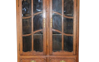 French Provincial bookcase in oak with paned glass door