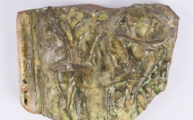 Glazed terracotta fragment depicting an equine animal next...