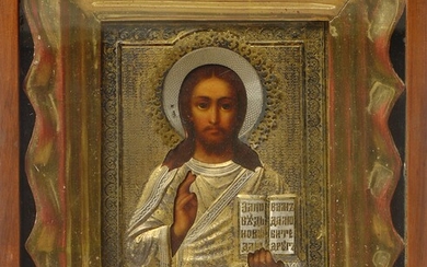 Icône peinte sur bois représentant le "Christ Pantocrator" munie d'une okled en argent et vermeil...