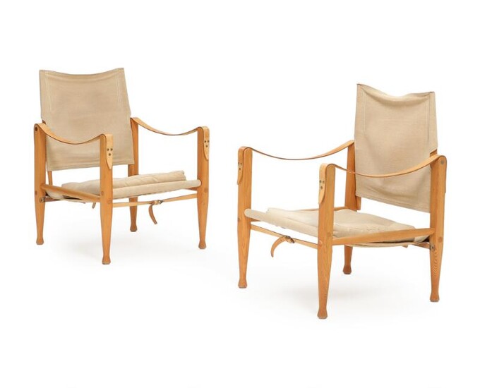 NOT SOLD. Kaare Klint: A pair of safari chairs with ash frame, upholstered with light canvas. Made by Rud. Rasmussen cabinetmakers. (2) – Bruun Rasmussen Auctioneers of Fine Art