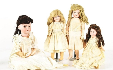 LOT OF 4: GERMAN BISQUE DOLLS AND EXTRA CLOTHING.