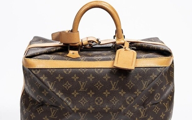 SOLD. Louis Vuitton: A "Cruiser" bag made of brown monogram canvas with brown leather trimmings and gold tone hardware. – Bruun Rasmussen Auctioneers of Fine Art