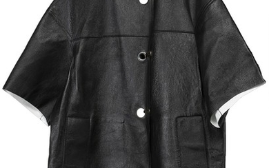 Marni: A long black leather jacket with 3/4 sleevees, two pockets and closure with three buckles on the front. Size 46 (IT)