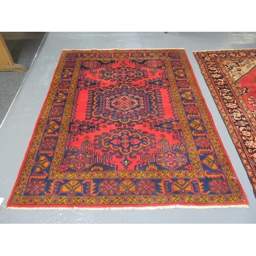 Middle Eastern design Viss on a red ground with mulit-colour...