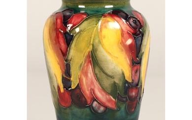 Moorcroft pottery vase of baluster form decorated in the lea...