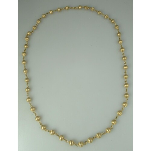 Necklace of 9ct gold beads with satin finish. Length 28 inc...