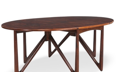 Niels Koefoed: Dining table with oval Brazilian rosewood top with flip-down leaves and integrated joints. Mahogany frame with six V-shaped gatelegs.