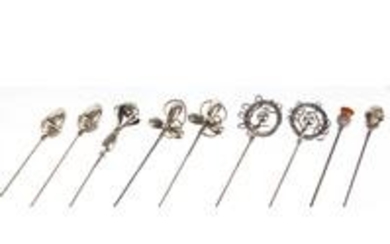 Nine silver hat pins including three pairs, some by
