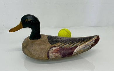 North American carved wood decoy duck, 33 cm long. This lot...