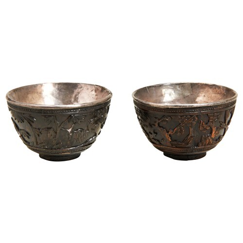 PAIR OF CARVED COCONUT AND SILVER LINED WINE CUPS KANGXI PER...